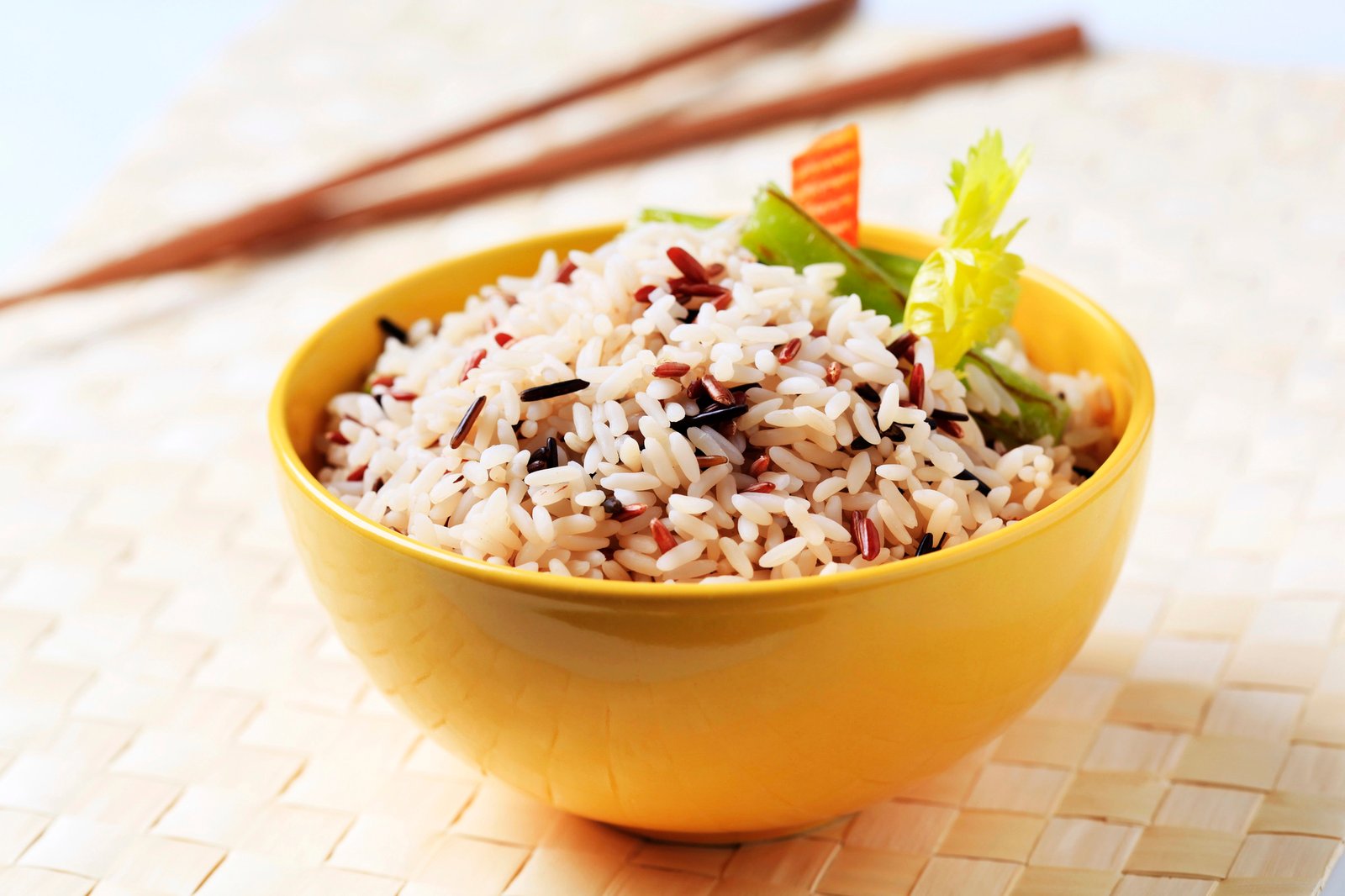 Bowl of cooked mixed rice - closeup