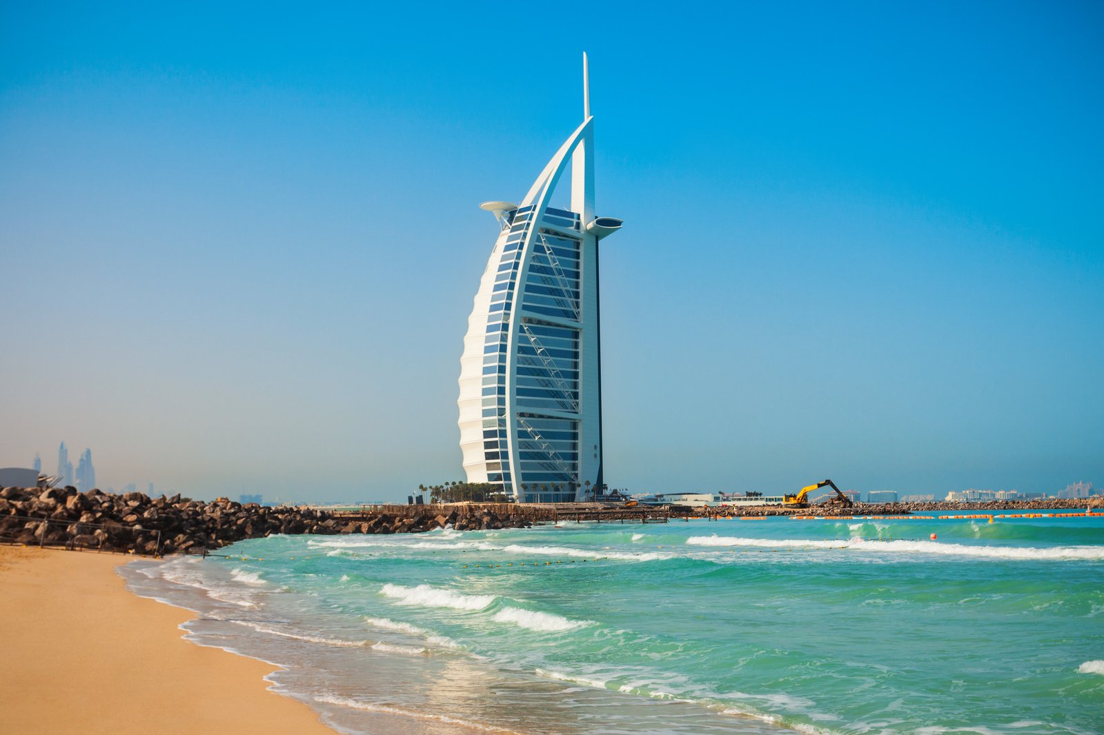 DUBAI, UAE - FEBRUARY 27, 2019: Burj Al Arab luxury hotel and Jumeirah public beach in Dubai city in UAE