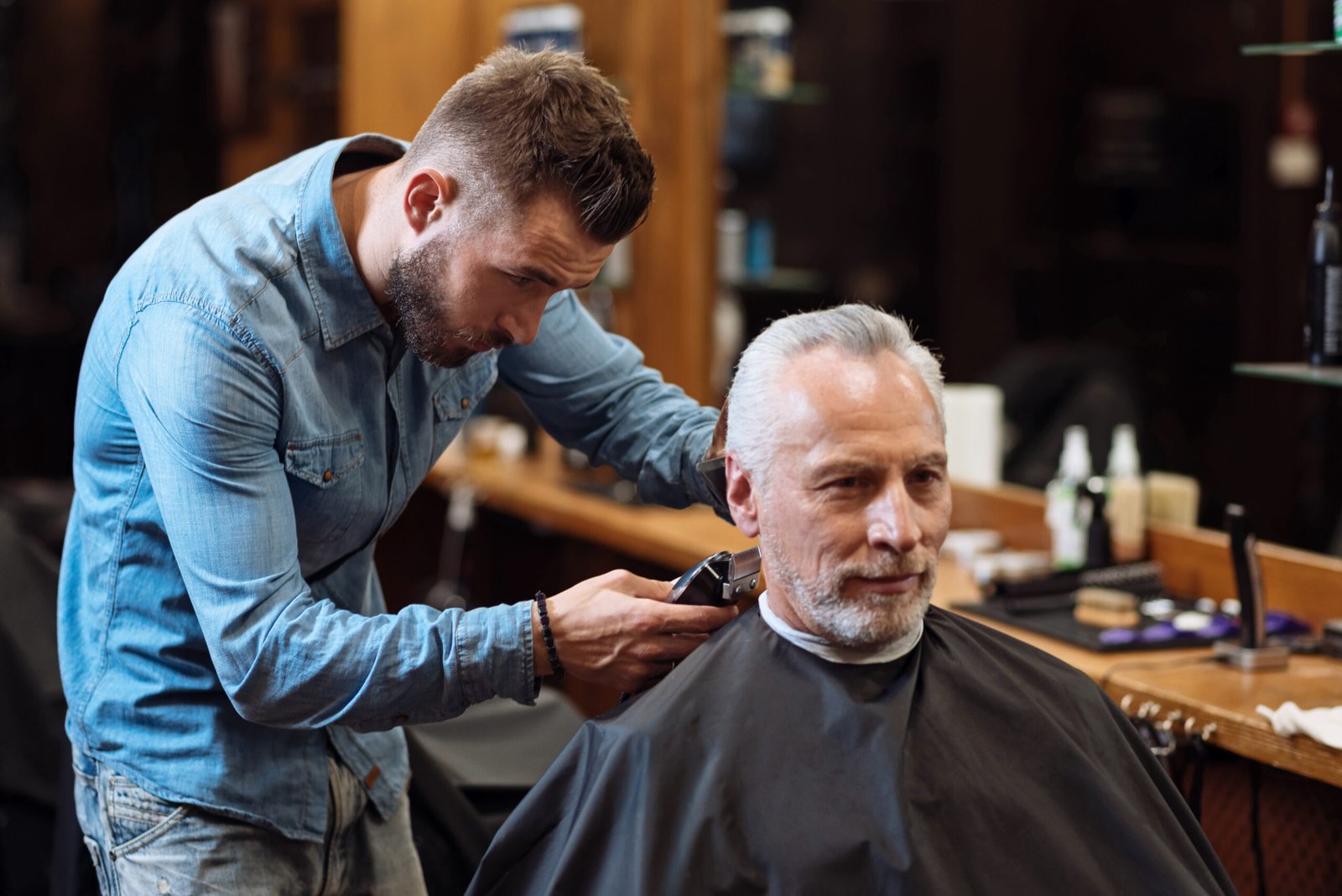 Handsome,Barber,Trimming,Hair,Of,Old,Man