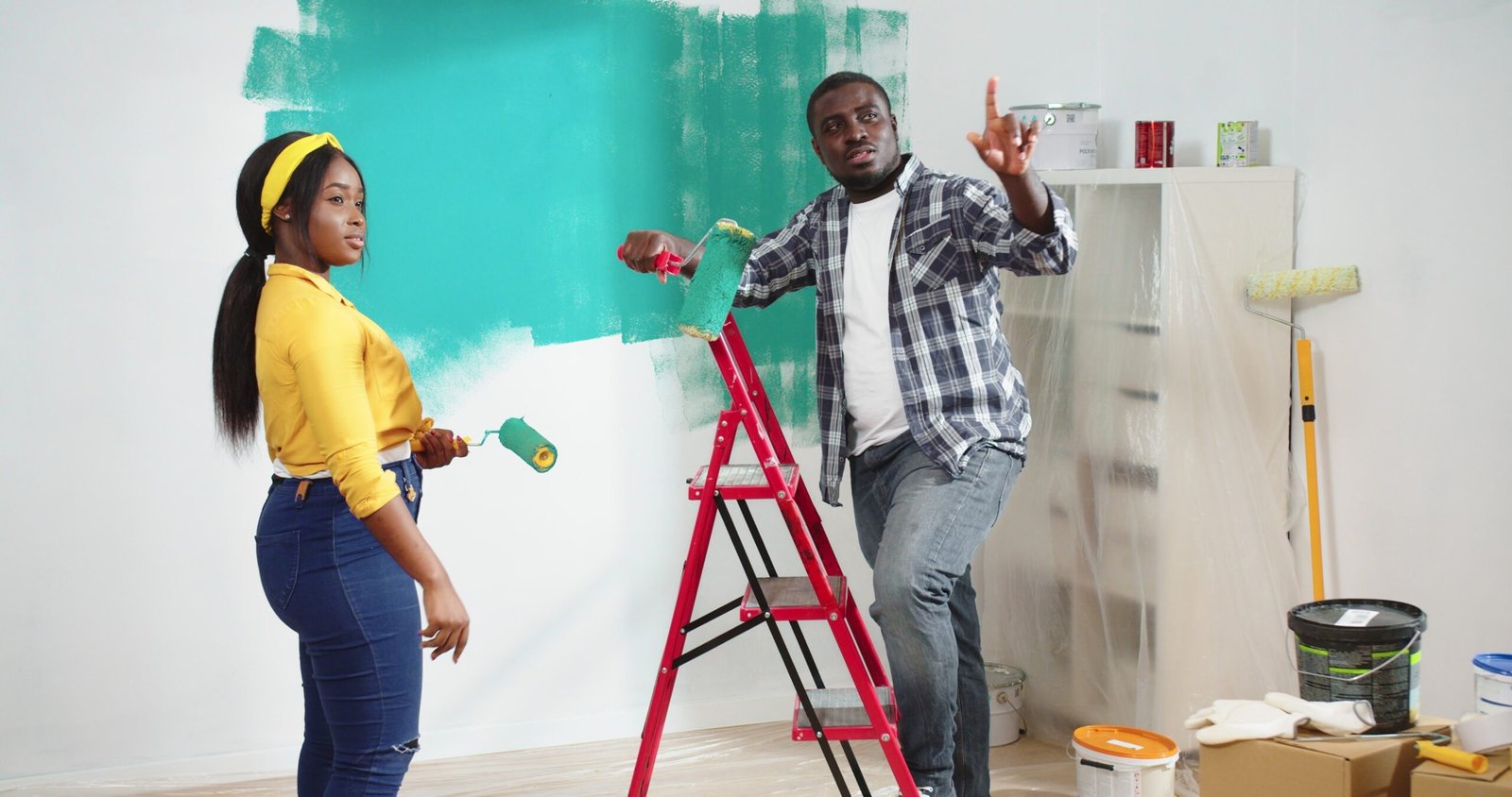 Happy,Young,African,American,Couple,Stands,In,Room,In,New