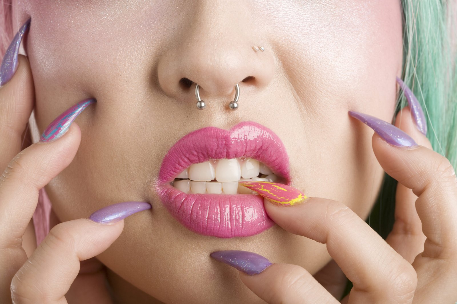 Close-up,Of,Woman's,Mouth,And,Fingers